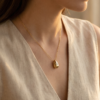 Collier Gutta